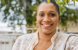 A woman smiling at the camera