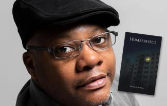 A man looking at the camera, with an inset of a book cover