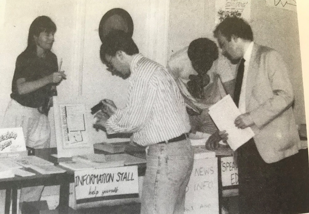 People at an information stand